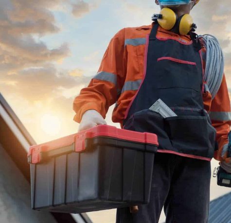 Team from KS Roof Master Limited performing emergency roof repairs in London, UK
