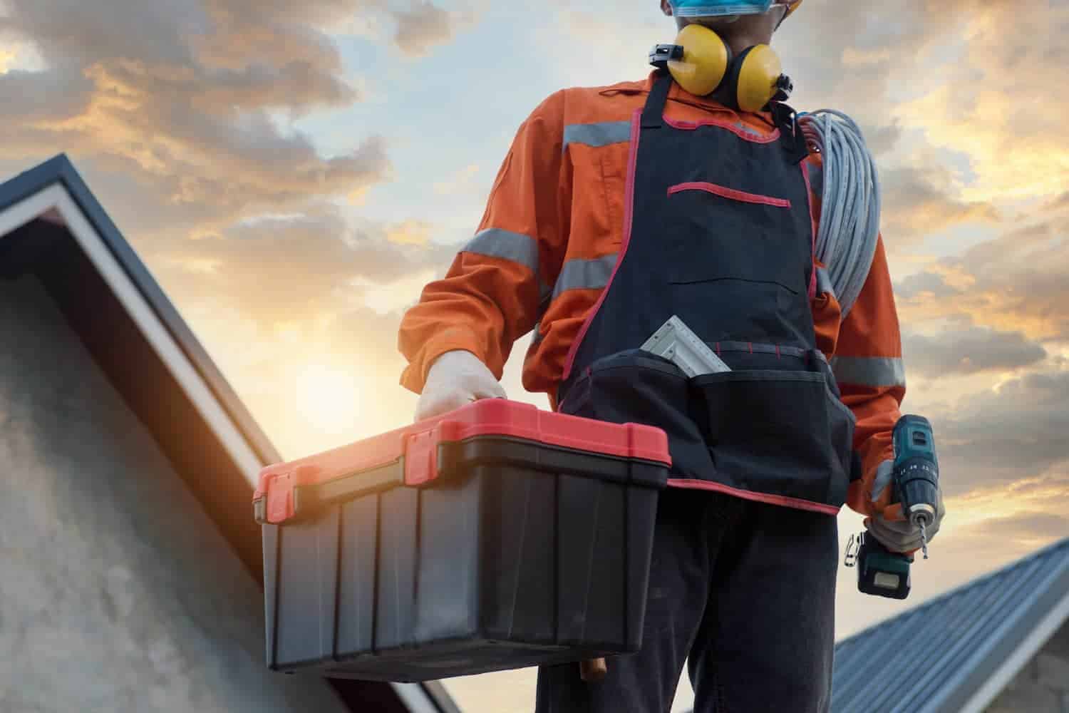 Team from KS Roof Master Limited performing emergency roof repairs in London, UK