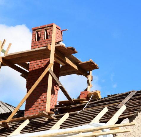 KS Roof Master Limited team undertaking chimney and party wall repair in London, UK