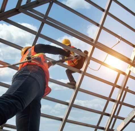 Skilled workers of KS Roof Master Limited installing a slate roof in London, UK
